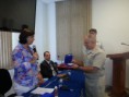 /album/galeria-de-fotos-da-reuni%c3%a3o-da-5%c2%aa-aisp-na-avcfn/contra-almirante-elkfury-sendo-homenageado-pela-presidente-maria-jo%c3%a3o-da-5%c2%aa-area-integrada-de-seguran%c3%a7a-publica-jpg/
